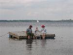 Eric, Kade, and Missy on diving dock