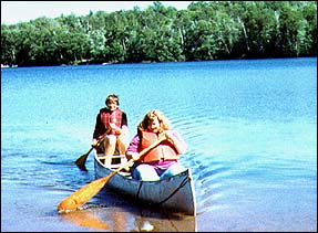Photo. Anton and Beth in a canoe on Perry Lake