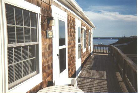 view of deck and door to unit