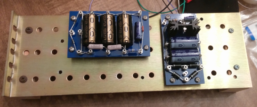 power supply boards attached to prototyping plate
              for testing