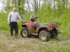 John oblivious to his flattening left-rear tire on the Red Top ATV Trail (Red Top, MN) - 5/29/05