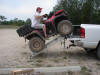 John loading ATV at Brevort to Trout Lake trail (Brevort, MI) - 7/14/06