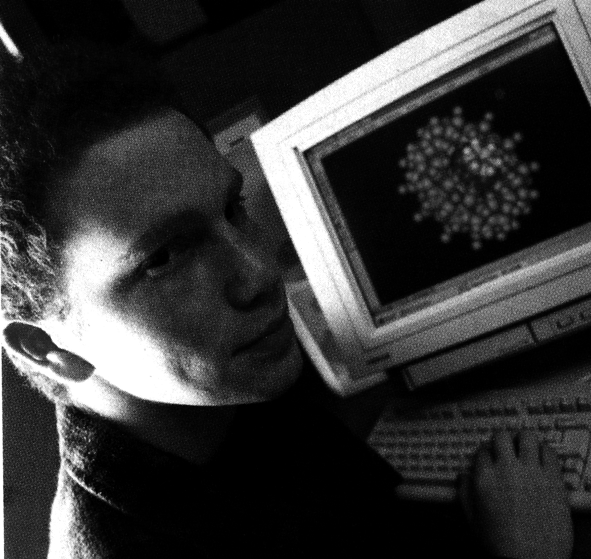 Adam Silverman working on a computer.