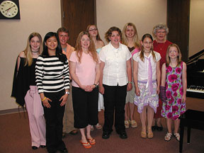 Second photo of Jerri and students